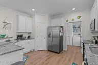 101 SW 28th Street, Oak Island, NC 28465 — 5-bedroom home in Pinners Point, Oak Island, NC, photo 17 of 56: Kitchen