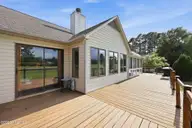 833 Pelican Drive, New Bern, NC 28560 — 3-bedroom waterfront home in Fairfield Harbour, New Bern, NC, photo 3 of 44: Full Length Deck
