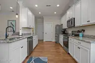 129 NW 11th Street, Oak Island, NC 28465 — 3-bedroom home in Pinners Point, Oak Island, NC, photo 11 of 63: kitchen