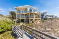 469 Maritime Place, Pine Knoll Shores, NC 28512 — 4-bedroom waterfront home in Beacon's Reach, Pine Knoll Shores, NC, photo 1 of 48: 21-web-or-mls-chadwick-visuals-469-marit
