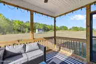 9001 Fox Trot Circle, Middlesex, NC 27557 — 3-bedroom home in Beaver Creek, Middlesex, NC, photo 24 of 33: 24-Alt View Screen Porch