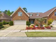 8266 Stenton Drive NE, Leland, NC 28451 — 3-bedroom townhome in Compass Pointe, Leland, NC, photo 3 of 58: 01-DJI_20260508123527_0195_D