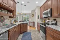 2037 Fanning Court, Leland, NC 28451 — 4-bedroom home in Waterford of the Carolinas, Leland, NC, photo 13 of 64: Kitchen