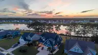 188 Spicer Lake Drive, Holly Ridge, NC 28445 — 5-bedroom waterfront home in Summerhouse On Everett Bay, Holly Ridge, NC, photo 3 of 57: DJI_20260921191803_0673_D-HDR