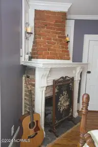 122 S Academy Street, Washington, NC 27889 — 2-bedroom home in Historic District, Washington, NC, photo 23 of 77: Fireplace in 2nd Bedroom