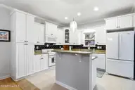 503 W Yacht Drive, Oak Island, NC 28465 — 4-bedroom home in Tranquil Harbor, Oak Island, NC, photo 10 of 53: Kitchen