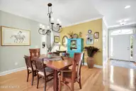 1121 Sandy Beach Circle, Leland, NC 28451 — 3-bedroom waterfront townhome in Waterford of the Carolinas, Leland, NC, photo 10 of 58: Dining Room