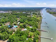2162 402 Oyster Harbour Parkway SW, Supply, NC 28462 — lot in Oyster Harbour, Supply, NC, photo 5 of 40: 05-Final Drone 3431 Skipping Stone Ct SW