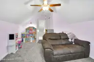 334 Station House Road, New Bern, NC 28562 — 3-bedroom home in Croatan Crossing, New Bern, NC, photo 24 of 39: Finished room over garage