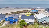 461 E Third Street, Ocean Isle Beach, NC 28469 — 4-bedroom waterfront home, Ocean Isle Beach, NC, photo 1 of 57: Back of house
