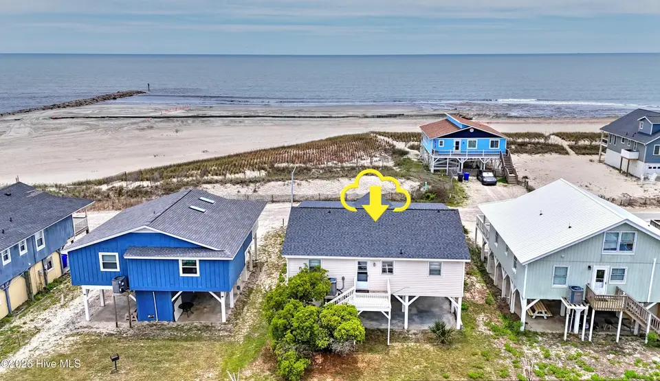 461 E Third Street, Ocean Isle Beach, NC 28469 — 4-bedroom waterfront home, Ocean Isle Beach, NC, photo 1 of 57: Back of house