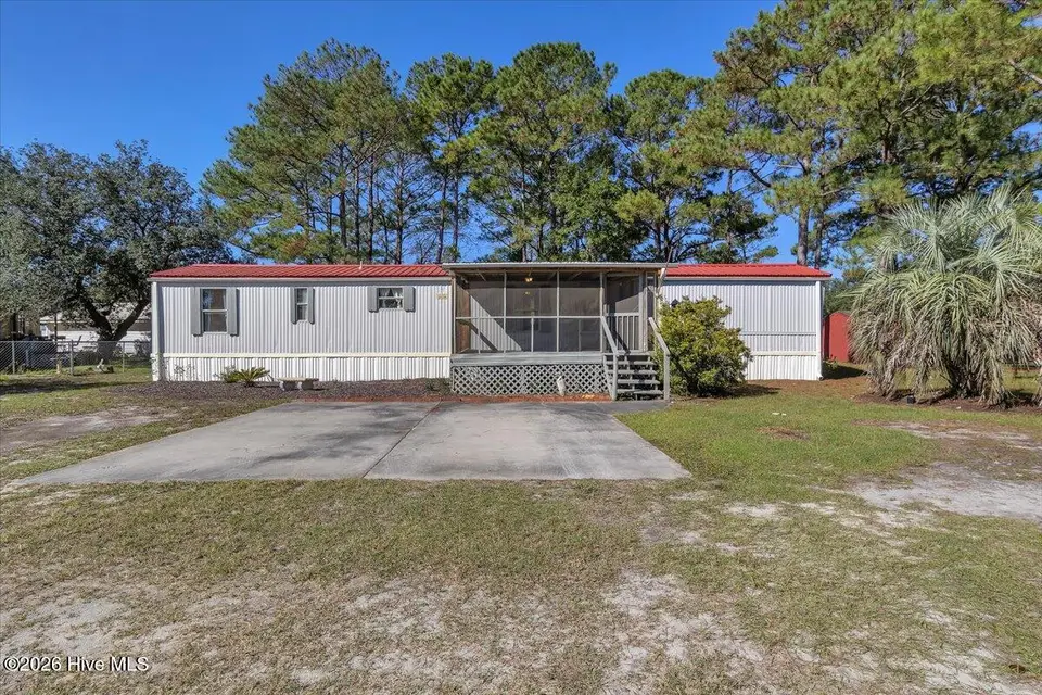 2387 Jolly Roger Drive SW, Supply, NC 28462 — 2-bedroom manufactured home in Buccaneer Hills, Supply, NC, photo 1 of 40: 01-Final 2387 Jolly Roger Dr SW Supply-R