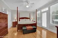 134 Wild Berry Lane, Hampstead, NC 28443 — 5-bedroom waterfront home in Bent Tree, Hampstead, NC, photo 14 of 46: Owners suite