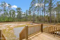 9163 Southern Boulevard SE, Winnabow, NC 28479 — 3-bedroom home, Winnabow, NC, photo 5 of 28: Back porch