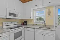 103 24th Street, Emerald Isle, NC 28594 — 4-bedroom townhome in Emerald Isle By The Sea, Emerald Isle, NC, photo 7 of 51: Kitchen