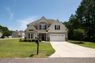 701 Tuscarora Drive, Holly Ridge, NC 28445 — 5-bedroom home in Village at Folkstone, Holly Ridge, NC, photo 1 of 49