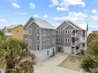 9813 Sandy Court, Emerald Isle, NC 28594 — 4-bedroom waterfront home in Dolphin Ridge, Emerald Isle, NC, photo 1 of 67: DJI_20260817123127_0048_D