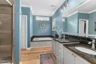 418 Vicksburg Court, Havelock, NC 28532 — 5-bedroom waterfront home in Plantation Harbor, Havelock, NC, photo 16 of 39: Primary Bathroom