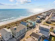 1308 Carolina Beach Avenue N Apt 2c, Carolina Beach, NC 28428 — 3-bedroom waterfront condo in Reefs, Carolina Beach, NC, photo 2 of 34: 5-print-8-print-DJI_20241203120453_0438_
