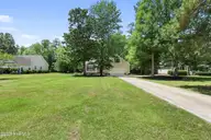 215 Oakmont Drive, Hampstead, NC 28443 — 3-bedroom home in Cross Creek, Hampstead, NC, photo 1 of 60