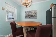 207 E Terminal Boulevard, Atlantic Beach, NC 28512 — 4-bedroom waterfront home, Atlantic Beach, NC, photo 23 of 68: Dining area view