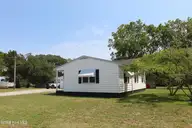 103 Cactus Street, Newport, NC 28570 — 2-bedroom waterfront home, Newport, NC, photo 2 of 31: View of home from the road