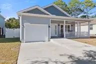 129 NW 8th Street, Oak Island, NC 28465 — 3-bedroom home in Tranquil Harbor, Oak Island, NC, photo 2 of 54: 129NW8thSt - 2