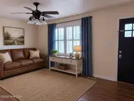 2103 Hilltop Lane, Goldsboro, NC 27530 — 3-bedroom home in Westover, Goldsboro, NC, photo 8 of 21: den virtually staged