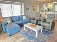 707 Pelican Court, Kure Beach, NC 28449 — 2-bedroom waterfront condo in Ocean Dunes, Kure Beach, NC, photo 11 of 31: living