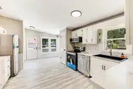 1660 White Duck Court SW, Supply, NC 28462 — 3-bedroom manufactured home in Wood Duck Retreat, Supply, NC, photo 10 of 28: Kitchen