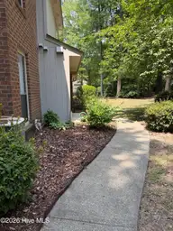812 Hidden Branches Close, Winterville, NC 28590 — 2-bedroom townhome in Treetops, Winterville, NC, photo 2 of 26: 812Side