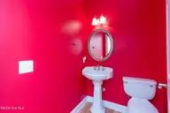 940 Diamondhead Drive S, Pinehurst, NC 28374 — 3-bedroom home in Unit 13, Pinehurst, NC, photo 4 of 41: powder room