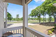 213 Kings Trail # 1004, Sunset Beach, NC 28468 — 2-bedroom condo in Sea Trail Plantation, Sunset Beach, NC, photo 4 of 52: 28_balcony