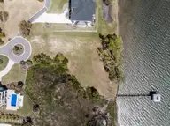Lot 21r Shipyard Lane, Hampstead, NC 28443 — waterfront lot in Sloop Point Plantation, Hampstead, NC, photo 23 of 36: 16-web-or-mls-DJI_20250409112342_0118_D