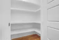 155 Everett Park Trail, Holly Ridge, NC 28445 — 3-bedroom waterfront home in Summerhouse On Everett Bay, Holly Ridge, NC, photo 10 of 39: Pantry