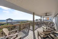 5419 W Beach Drive, Oak Island, NC 28465 — 7-bedroom waterfront home, Oak Island, NC, photo 12 of 69: 86_deck