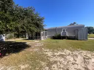 204 Diamond City Drive, Harkers Island, NC 28531 — 2-bedroom manufactured home in Earl Davis, Harkers Island, NC, photo 13 of 13: Back exterior