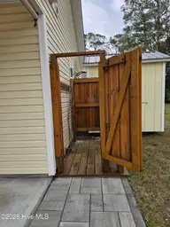 121 NE 75th Street, Oak Island, NC 28465 — 3-bedroom home in Tranquil Harbor, Oak Island, NC, photo 18 of 25: shower 3