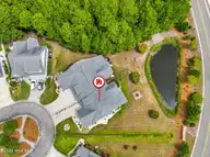 3299 Beach Cove Lane, Southport, NC 28461 — 2-bedroom waterfront townhome in St James, Southport, NC, photo 1 of 66