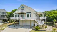 104 Bluewater Drive, Emerald Isle, NC 28594 — 3-bedroom home in Bluewater Bay, Emerald Isle, NC, photo 1 of 60: STREET VIEW