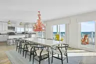 7313 Ocean Drive, Emerald Isle, NC 28594 — 5-bedroom waterfront home in Oakland Hills, Emerald Isle, NC, photo 13 of 66: Dining to Kitchen