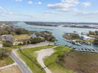 222 Hughes Road, Hampstead, NC 28443 — 3-bedroom waterfront home in Washington Acres, Hampstead, NC, photo 10 of 55: 66-web-or-mls-DJI_20260324120527_0837_D