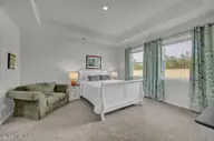2052 Willowleaf Drive, Leland, NC 28451 — 4-bedroom home in Grayson Park, Leland, NC, photo 12 of 50: Primary Bedroom