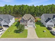 212 Independence Boulevard, Newport, NC 28570 — 4-bedroom home in Heritage Pointe, Newport, NC, photo 3 of 28: aerial front