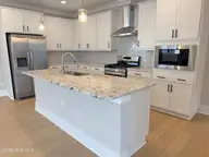 112 Flat Clam Drive, Wilmington, NC 28401 — 3-bedroom home in Riverside Cove, Wilmington, NC, photo 10 of 23: Kitchen