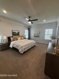 2726 Eliana Lane, Winterville, NC 28590 — 4-bedroom home in Copper Creek, Winterville, NC, photo 10 of 27: 2604 Primary Bedroom
