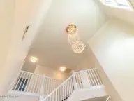 211 Cheswick Drive, Holly Ridge, NC 28445 — 3-bedroom home in The Preserve At Morris Landing, Holly Ridge, NC, photo 12 of 65: Chandelier