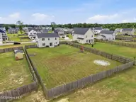 602 Ranch Hand Lane, Jacksonville, NC 28546 — 3-bedroom home in The Farm @ Hunter's Creek, Jacksonville, NC, photo 20 of 21: 36_backyard_aerial[1]
