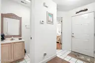 908 Resort Circle Unit 906, Sunset Beach, NC 28468 — 1-bedroom condo in Colony II, Sunset Beach, NC, photo 19 of 35: Hallway, 1/2 bath