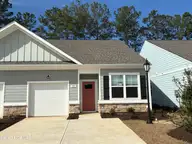 3555 Whaley Way NW, Ash, NC 28420 — 2-bedroom townhome in Brunswick Plantation, Ash, NC, photo 1 of 23: Lot 14 - 3555 Whaley Way NW